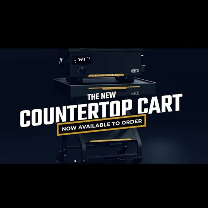 Cooking cart with drop-down utensil drawer open showing storage space