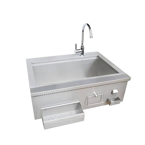 Stainless steel kitchen sink with faucet on a white background